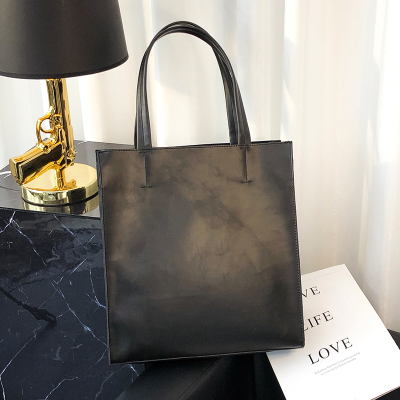 Borsa a mano minimalista in pe - Leather Briefcase recensione e prezzo